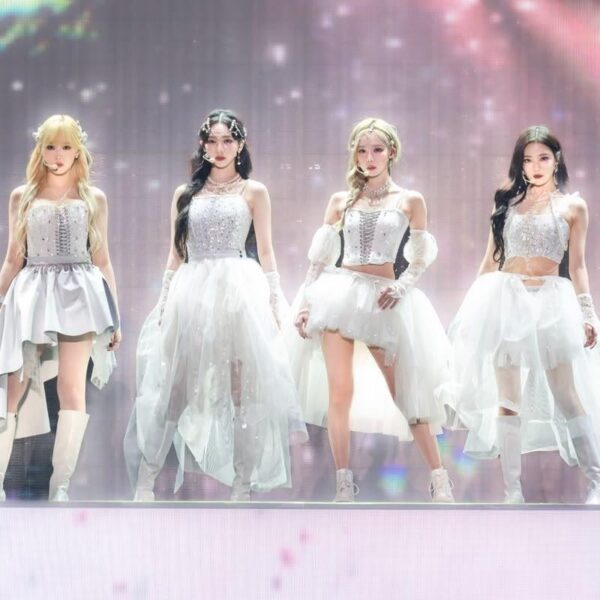 What is the designer and name of the clothes they’re wearing here?