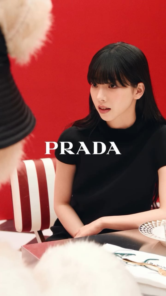 241128 Karina for PRADA - Mirroring gestures, PRADA Ambassador Karina plays with a special guest at the PRADA Holiday 2024 dinner party