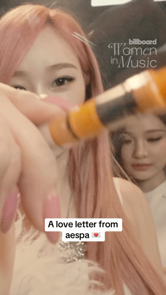 aespa sign Billboard's camera from backstage at Billboard Women in Music - 250330