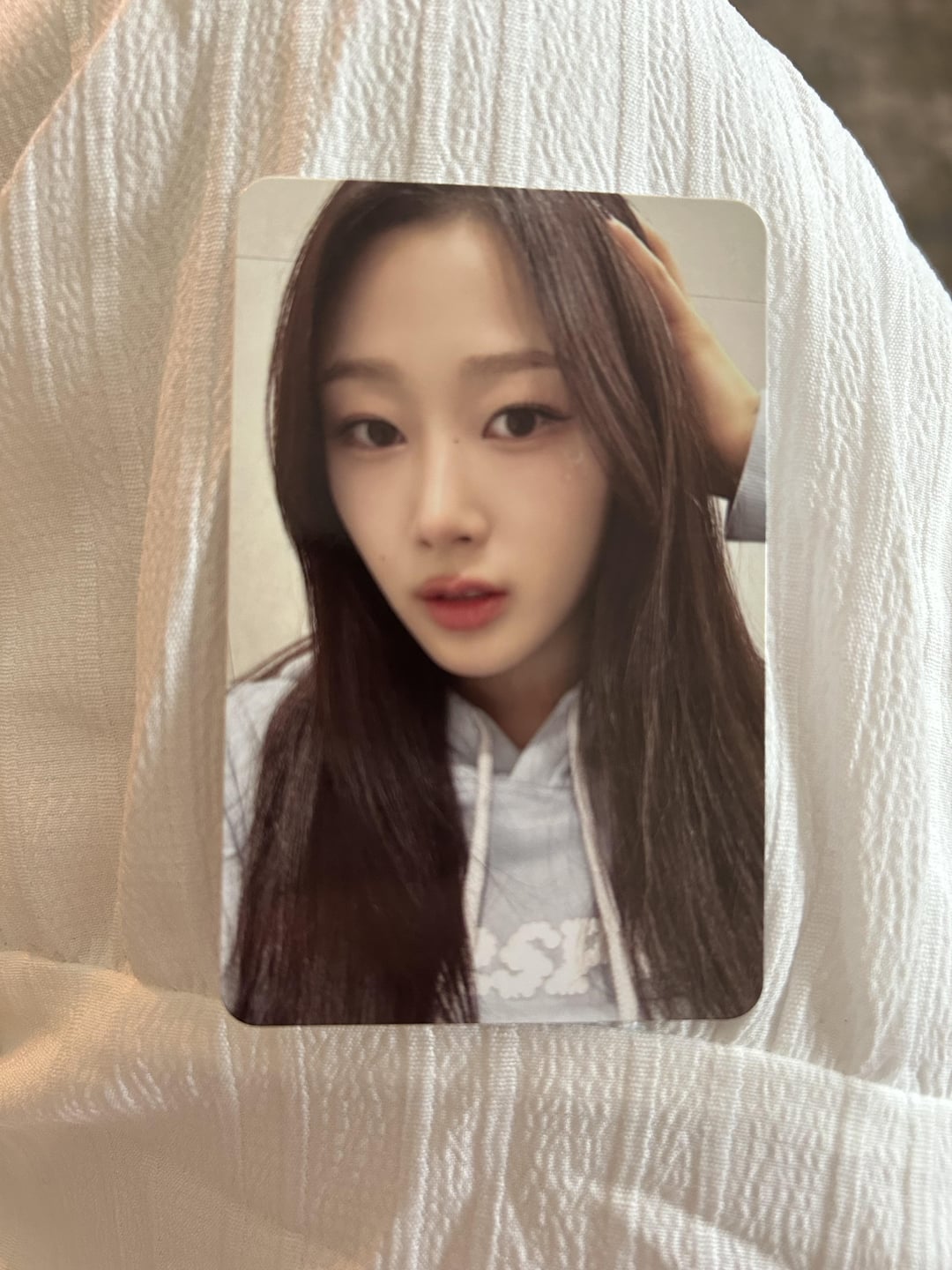 Does anyone know what the origins or the album this photocard is from?