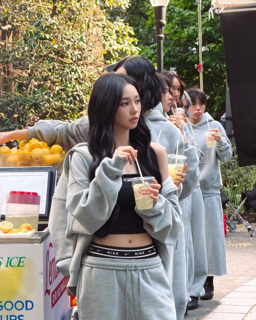 260731 Karina serving lemonade on set for Nike Studio Fleece